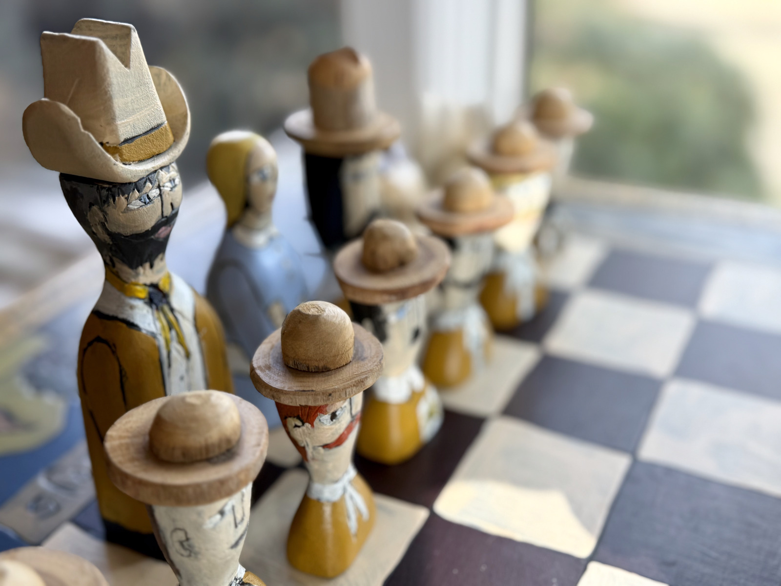 Vintage folk art carved chess set
