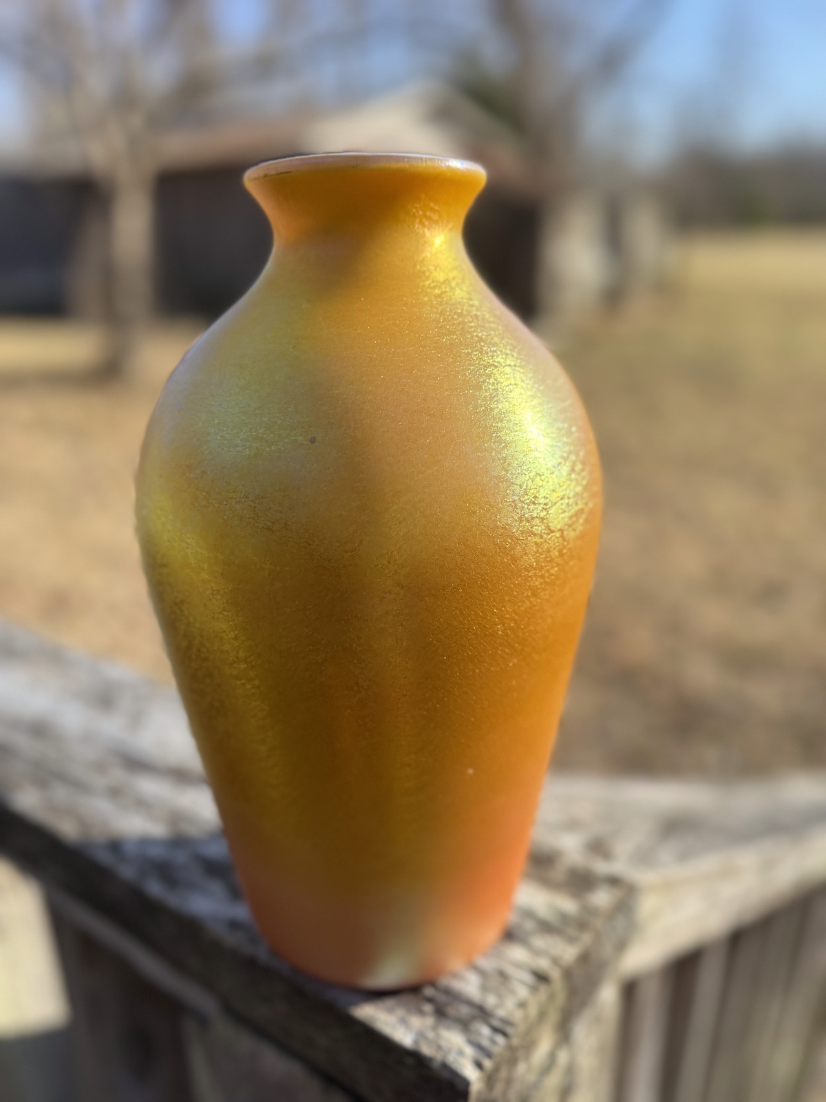 Iridescent amber art glass vase