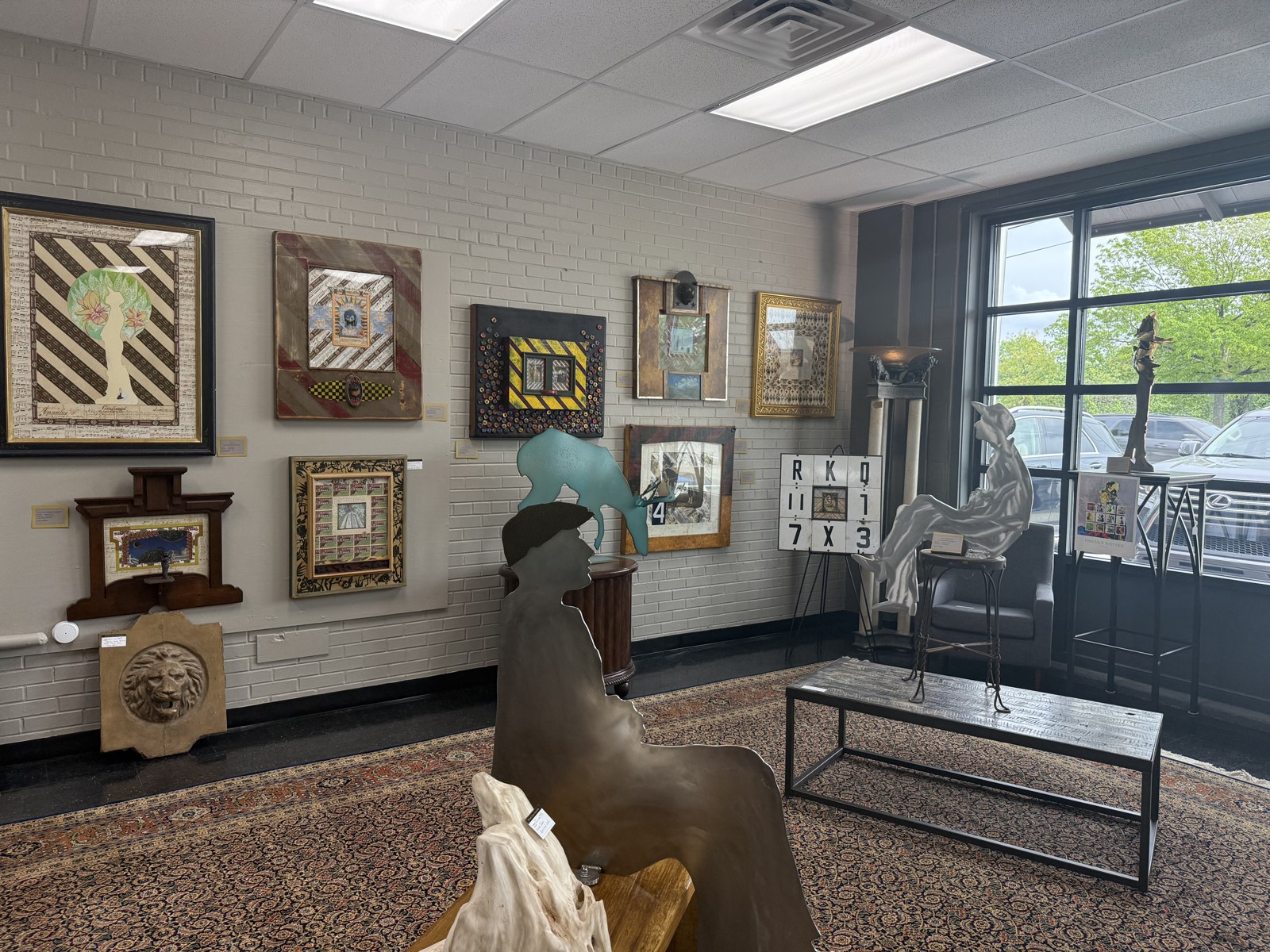 Schow's gallery interior with fine art and sculptures